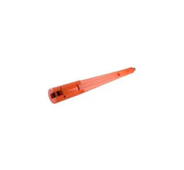 A red plastic tool is laying on its side.